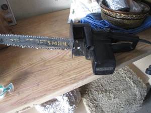 lot 212 image: Craftsman electric chain saw...