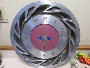 lot 224 image: Ford hubcap clock...