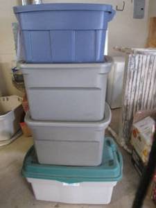 lot 234 image: Stack of Sterlite and Rubbermaid lidded storage totes