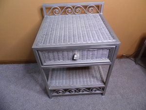 lot 154 image: Metal and Wicker collide with a hue of Satin Nickel for a stunning End table featuring a single drawer and lower tier display area