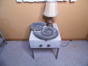 lot 156 image: Satin Nickel single drawer End table with metal shell and a copper tone accent lamp