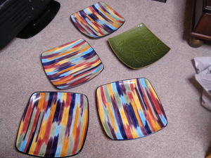 lot 163 image: Abstract water color hues adorn a set of decorative plates