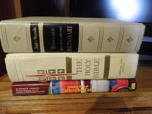lot 189 image: Hardcover Holy Bible, Standard Encyclopedic Dictionary and Complete book of Collectible Cars