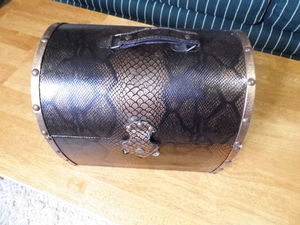 lot 193 image: Black and Gold Shimmer toned snakeskin style lidded storage chest style box