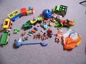lot 208 image: Wooden crate style toy box full of vintage toys including a Tupperware shape-o-ball