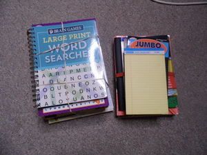 lot 209 image: Stack of word search books, note pads and other activity books