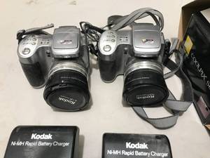 lot 93 image: 3 Cameras - Kodak, Nikon - condition unknown