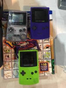 lot 252 image: 3 Game Boy Colors wGames and Case