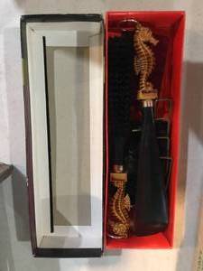 lot 259 image: Brush - Shoehorn & Wall Plaque Set