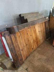 lot 289 image: Wood Bar, Stationary against a wall w Bottle display steps - 8ft long, 4 inches deep