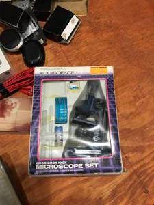 lot 349 image: Miscellaneous box of toys, games, camera, baseballs & poncho
