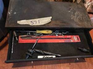lot 371 image: Toolbox filled with drill bits.