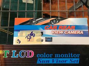 lot 385 image: TV Car Visor, Car Rearview Camera & Necklace