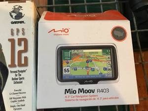 lot 389 image: MIO Moov Navigation & Garmin GPS Navigation and Camera
