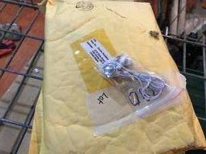 lot 390 image: Lot of approximately 50 earbuds, matches and 7up decoy can.