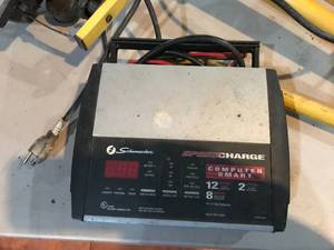 lot 408 image: Portable Light & Schumacher Battery Charger