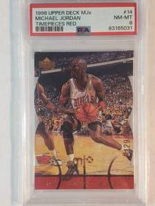 lot 5 image: Michael Jordan 1998 Upper Deck MJx Red Timepieces No. 14, Numbered 21292300, PSA NM-MT 8