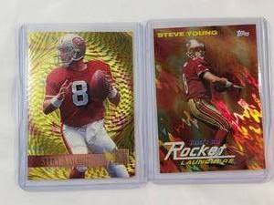 lot 217 image: Steve Young Lot of 2 1995 Fleer Metal No. 18 of 18, 1999 Topps Rocket Launchers No. SB8