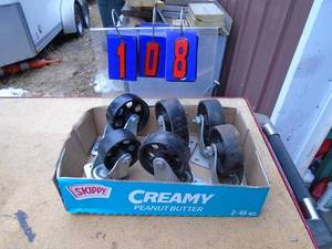 lot 108 image: Flat of casters. As shown.
