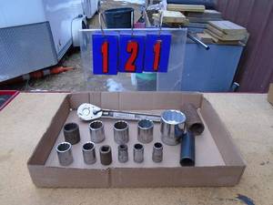 lot 121 image: 12 ratchet & misc sockets. As shown.