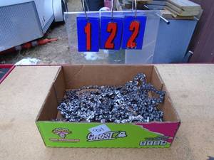 lot 122 image: Assorted chainsaw chains. 16 - 20. Look new As shown.