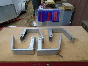 lot 128 image: Qty of 4 pickup camper tie downs. As shown.