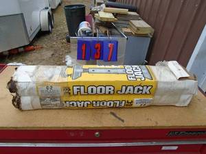 lot 137 image: Qty of 2 adjustable house floor jacks. As shown.