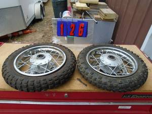 lot 126 image: Qty of 2 scooter wheels. As shown.