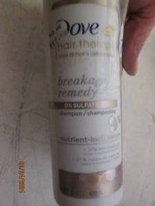 2 -13.5 oz bottles of dove shampoo
