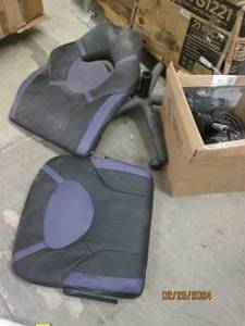 purple and black gaming chair needs work as is