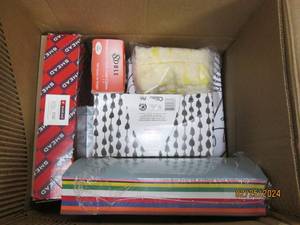 box of face tissue , gloves, paper and more
