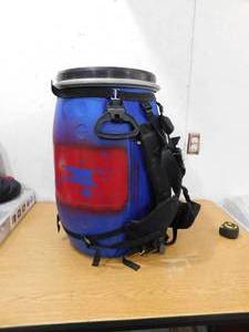 lot 10 image: Granite Gear Food Barrel with harness
