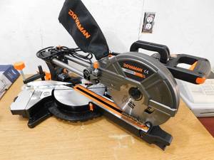 lot 38 image: NEW - DOVAMAN 10 inch Sliding Compound Miter Saw