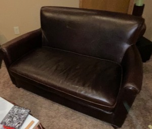 lot 2123 image: Leather love seat