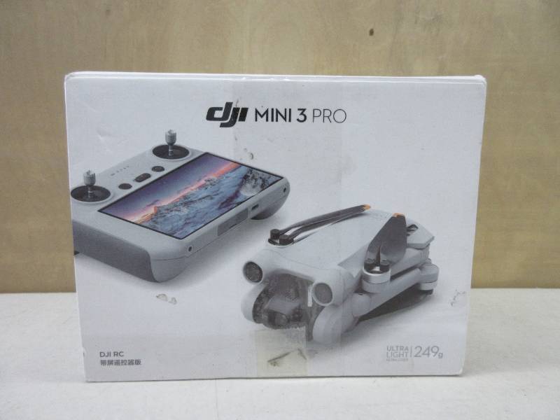 lot 238 image: DJI Mini 3 Pro (DJI RC) Lightweight and Foldable Camera Drone with 4K60fps Video, 48MP Photo, 34-min Flight Time, Tri-Directional Obstacle Sensing, Ideal for Aerial Photography and Social Media  MISSING CAMERA PROTECTIVE COVER, SD CARD, 1 SCREW DRIVER.