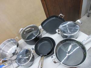 lot 656 image: All-Clad Essentials Hard Anodized Nonstick Cookware Set 10 Piece Oven Safe 350F Pots and Pans Black NEW A COUPLE OLF PANSPOTS SLIGHTLY DAMAGED (see pictures for details) STILL IN GREAT CONDITION