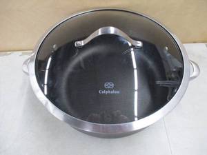 lot 679 image: Calphalon Contemporary Nonstick 8.5 Qt. Dutch Oven With Lid - Slightly Dented - Still in nice condition.