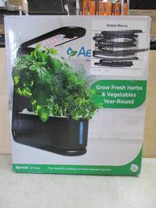 lot 700 image: AeroGarden Sprout - Indoor Garden with LED Grow Light, Black - Open Box, Missing Plant Pods, Electronics Work.
