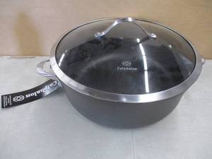 lot 704 image: Calphalon Contemporary Nonstick 8.5 Qt. Dutch Oven With Lid - Slightly Dented - Still in nice condition.