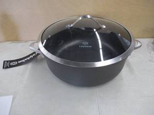 lot 705 image: Calphalon Contemporary Nonstick 8.5 Qt. Dutch Oven With Lid - Slightly Dented - Still in nice condition.