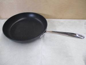 lot 707 image: All-Clad Essentials Nonstick Cookware (12 Inch Fry Pan) - Slight Scratches, In Nice Condition.