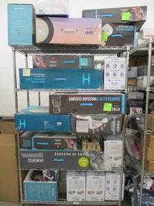 lot 714 image: Rack full of Homedics, Vaporizers, Massagers, Purifiers and More - These items all have some issues or make noise - For PartsRestore