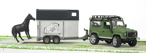 lot 728 image: Bruder Toys (2592) Land Rover Defender Station Wagon with Horse Trailer & Horse, Packaging Damaged, Toy in Nice condition.