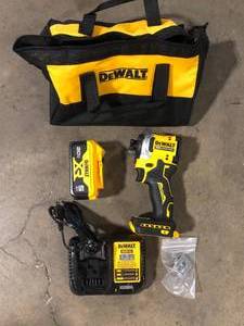 DEWALT ATOMIC 20V MAX Lithium-Ion Cordless 14 in. Brushless Impact Driver Kit, 5 Ah Battery, Charger, and Bag Customer Returns See Pictures