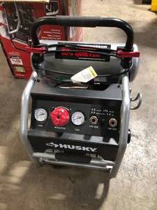 Husky 4.5 Gal. Portable Electric-Powered Silent Air Compressor    Customer Returns See Pictures