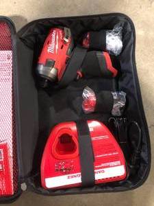 Milwaukee M12 FUEL SURGE 12V Lithium-Ion Brushless Cordless 14 in. Hex Impact Driver Compact Kit wTwo 2.0Ah Batteries, Bag  Customer Returns See Pictures