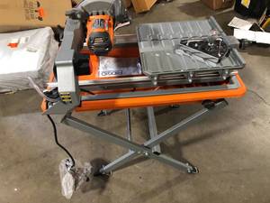 RIDGID 9-Amp 7 in. Blade Corded Wet Tile Saw with Stand   Customer Returns See Pictures