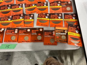 TABLE FULL OF SANDING DISCS