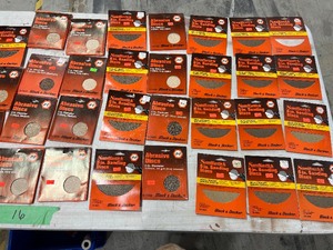 TABLE FULL OF SANDING DISCS