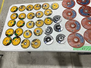 TABLE FULL OF GRINDING DISCS